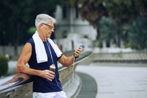 Senior-checking-fitness-tracker