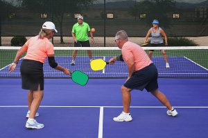 seniors playing Pickleball doubles
