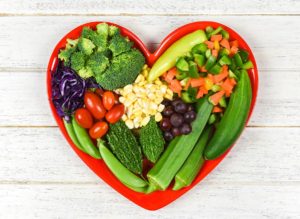 A heart-shaped platter of vegetables